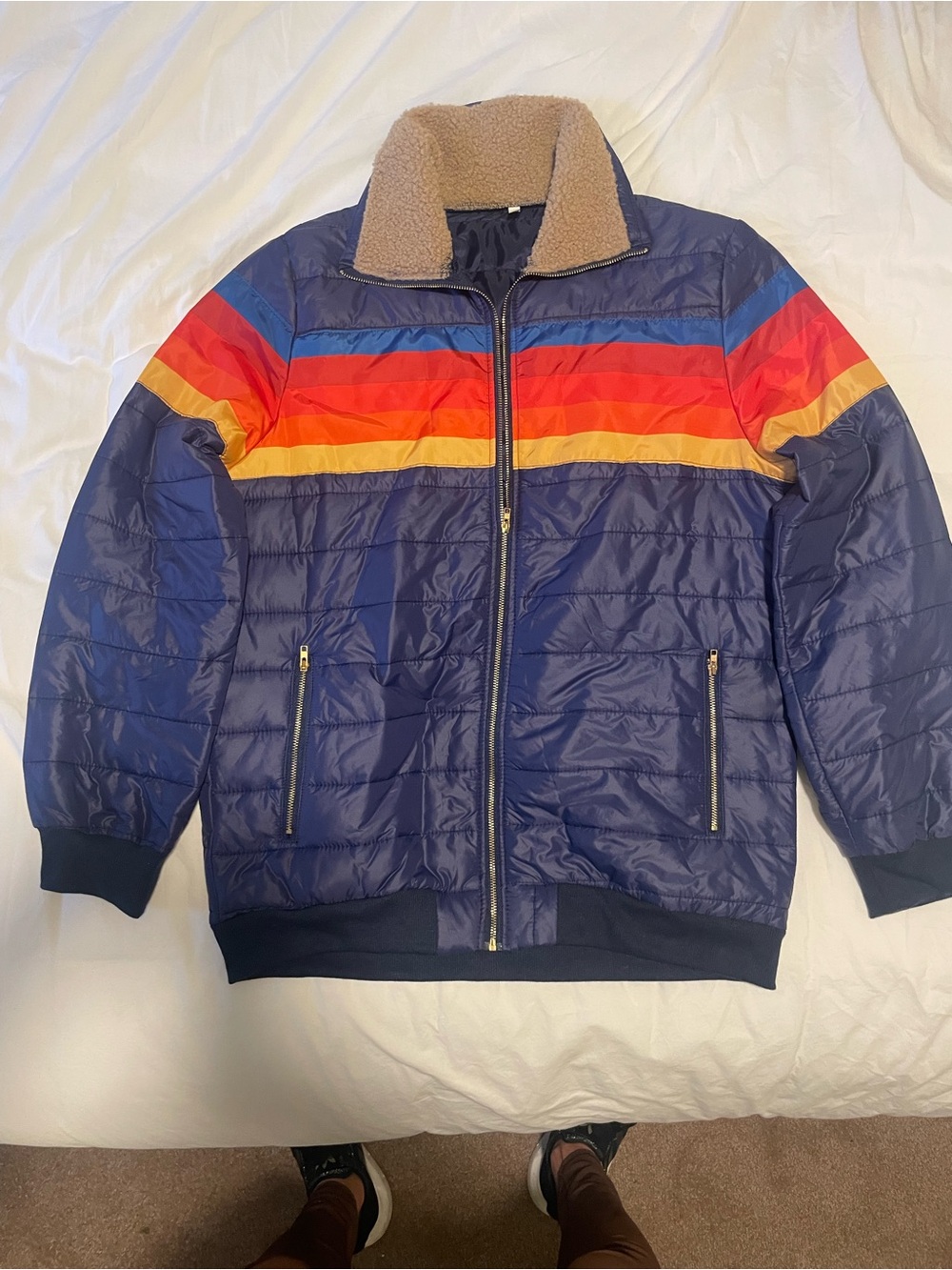 Women or men’s lightweight puffer jacket. Women’s large or men’s small.